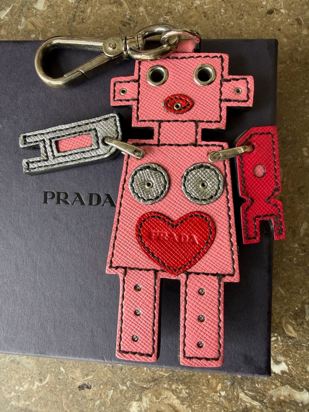 PRADA AUTHENTIC Robot Saffiano Leather Bag Charm
You could make a keyring